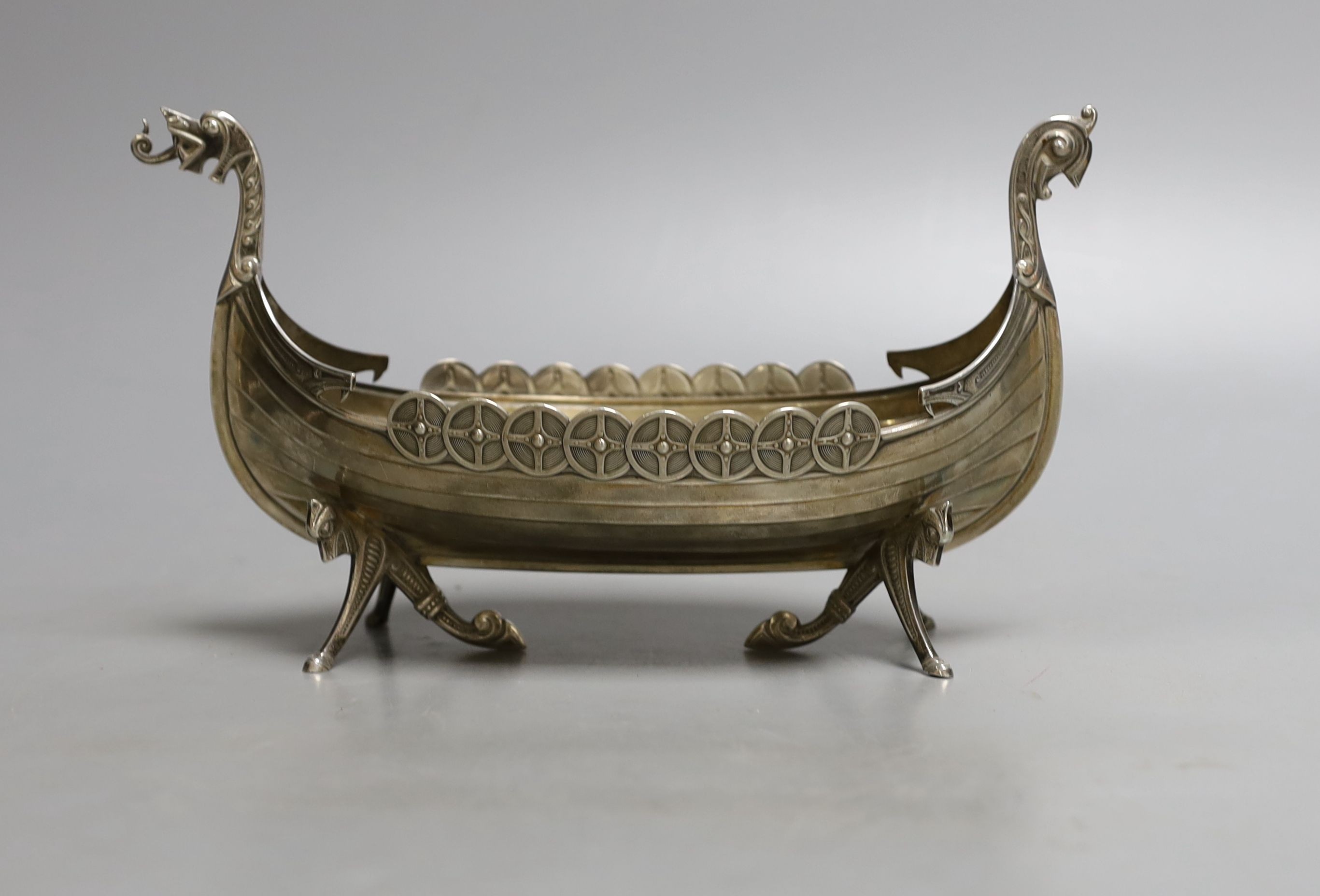 A Scandinavian? white metal model of a Viking ship, length 21.8cm, 7oz.